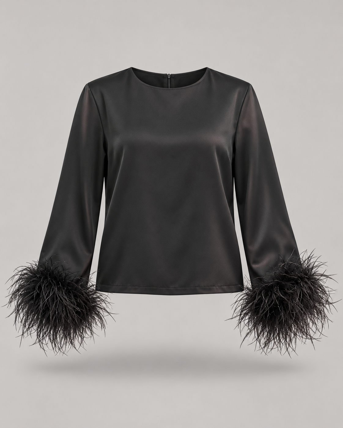 CELYE - Blusa in raso con piume ai polsi