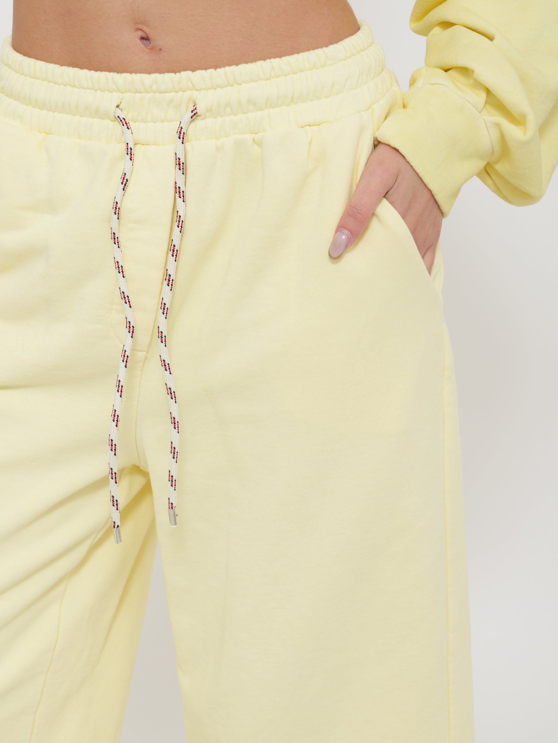 Tuta bermuda con laccio regolabile