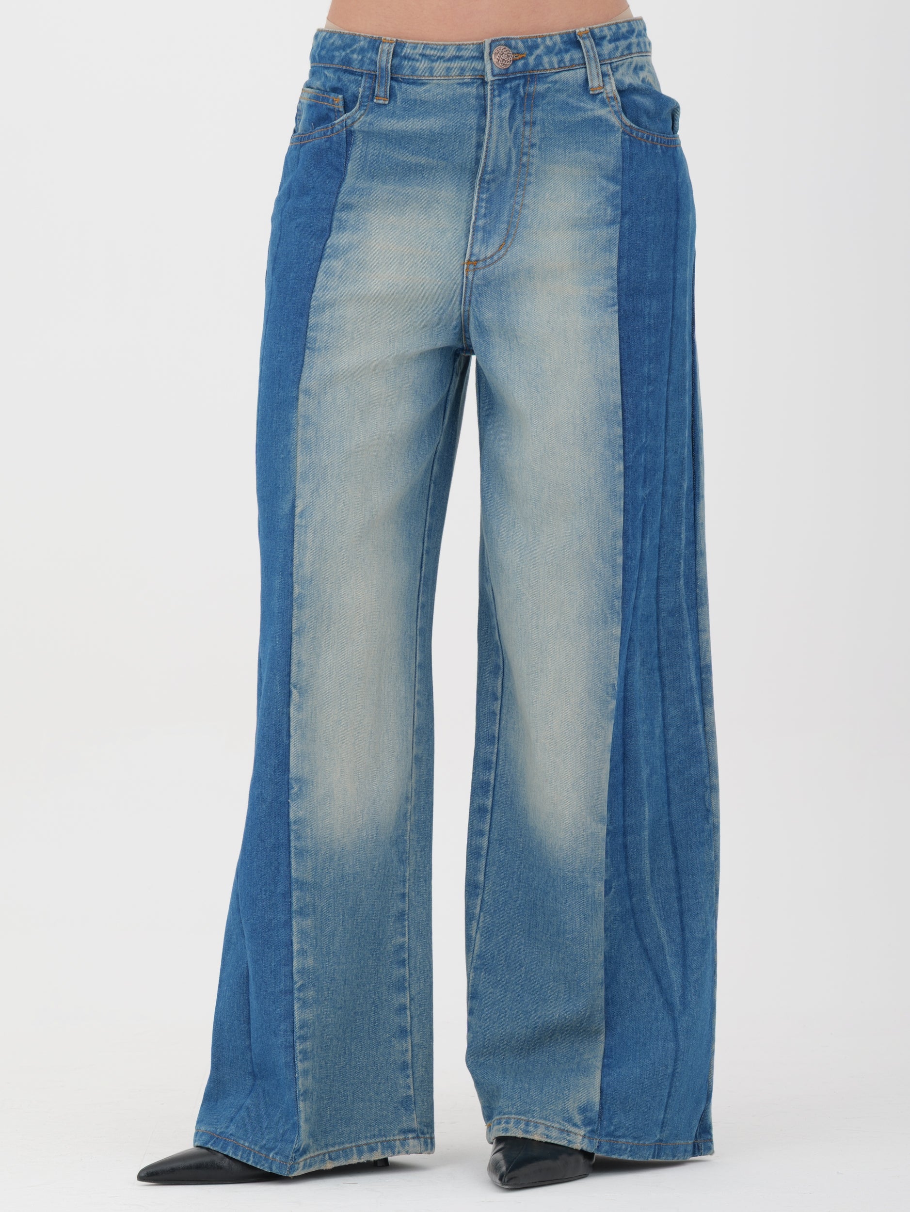 Jeans tensione in fondo largo