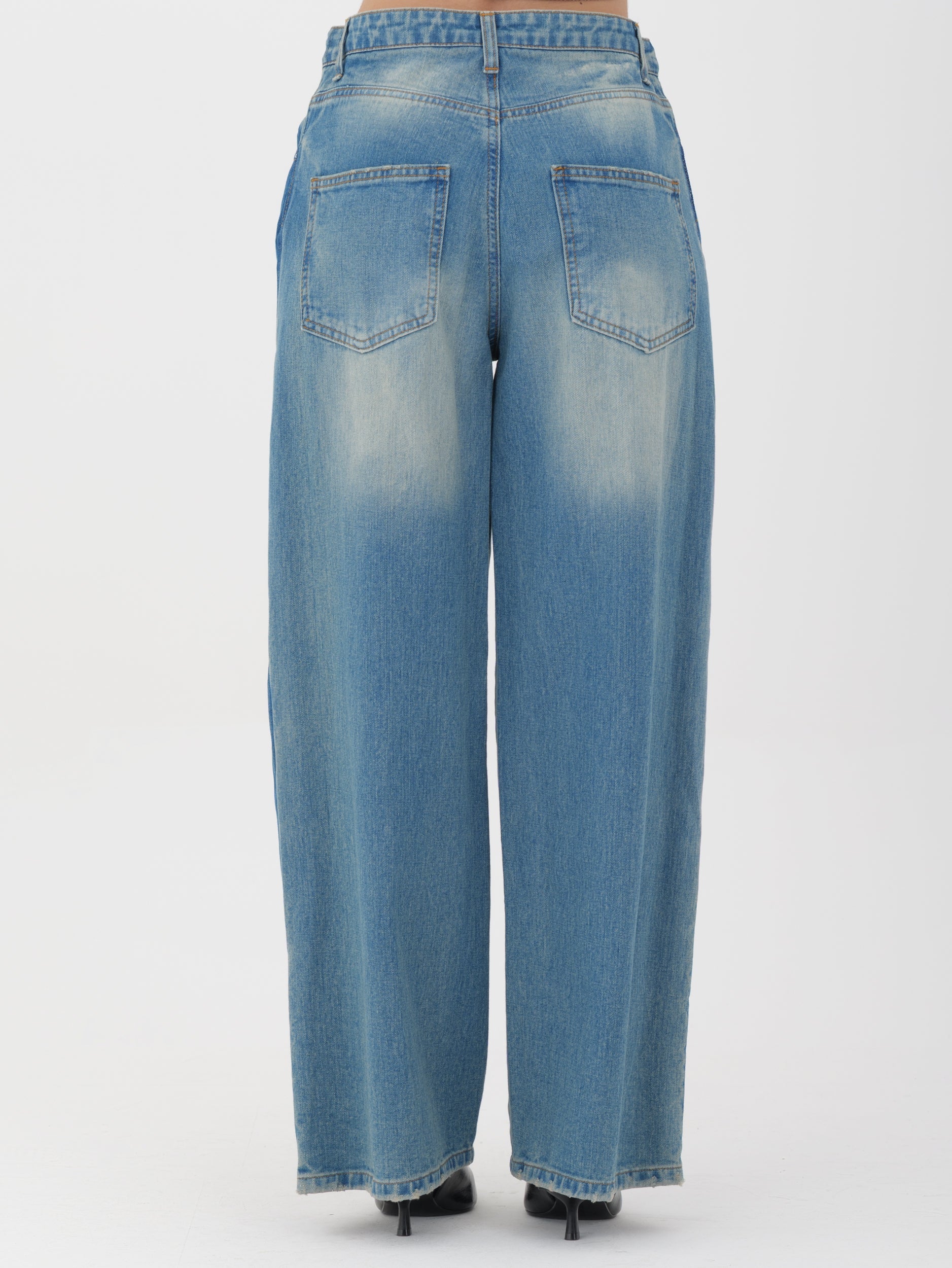 Jeans tensione in fondo largo